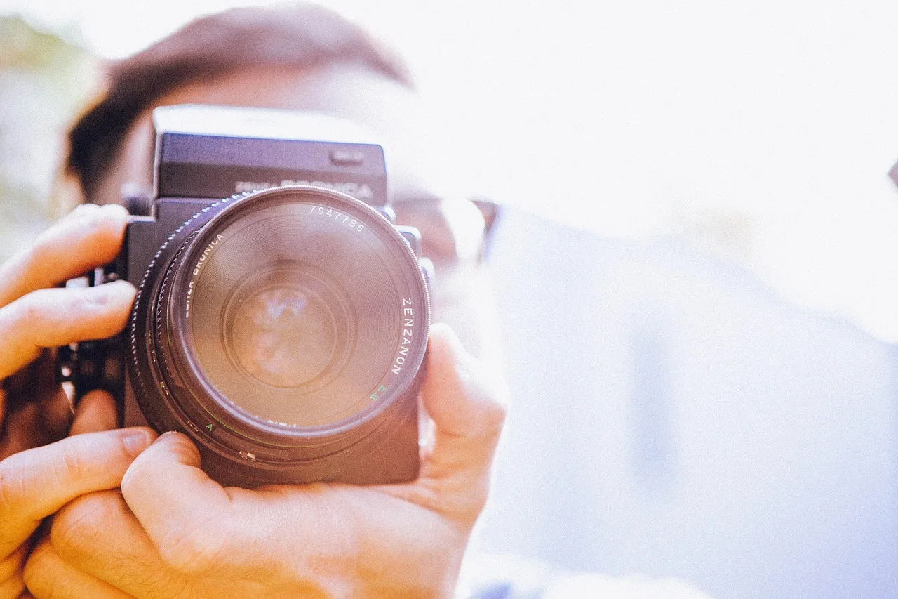 photographer, photography, digital camera, dslr camera, camera, man, hands, hobby, photographer, photographer, photographer, photographer, photographer, camera, camera, camera, camera. The wage question in a photography business in 2027